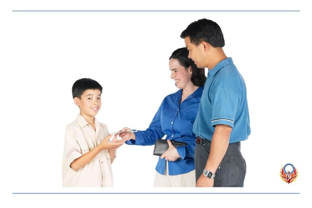 young boy receiving money from his mother's wallet. Father is standing beside mom. 