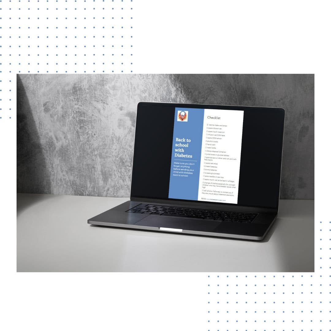 laptop sitting on desk with grey wall behind it. On the laptop screen is an image of the back to school checklist for children with diabetes from Diabetes Advocacy